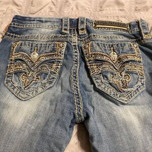 Rock Revival Blue Boot Cut Jeans with Decorative Stitching